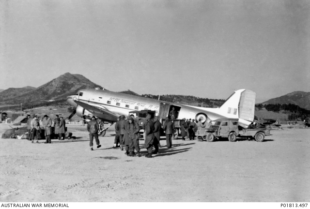 Members of 3RAR preparing to board RAAF C-47 at Kimpo airfield, South Korea in 1951