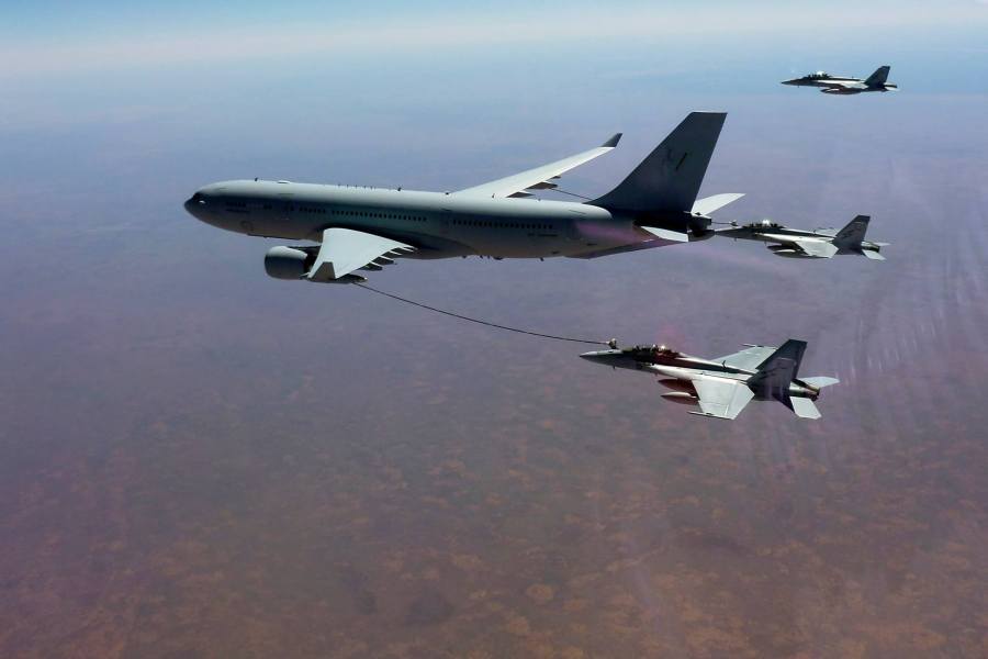 RAAF KC-30A Multi Role Tanker Transport aircraft refuels an F/A-18F Super Hornet en-route to the Middle East - Late September 2014