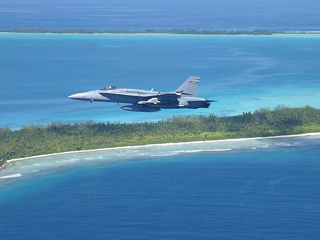 RAAF F/A-18A flying over Diego Garcia in 2002 during Operation Slipper 