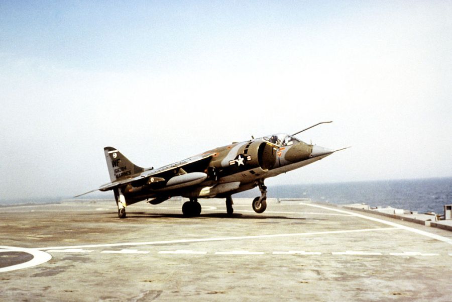 USMC Hawker Siddeley AV-8C Harrier from Marine Attack Squadron VMA-513 Flying Nightmares takes off from an Austin-class amphibious transport dock ship in 1982 