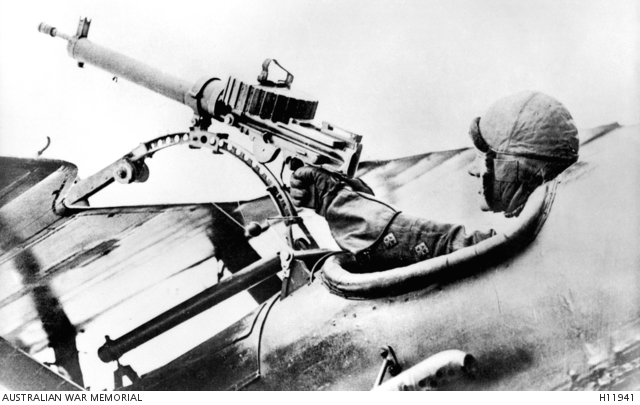 A British Air Ministry photo demonstrating the .303 Lewis "Pilots deadly machine gun" on the over wing foster mounting of the S.E.5a