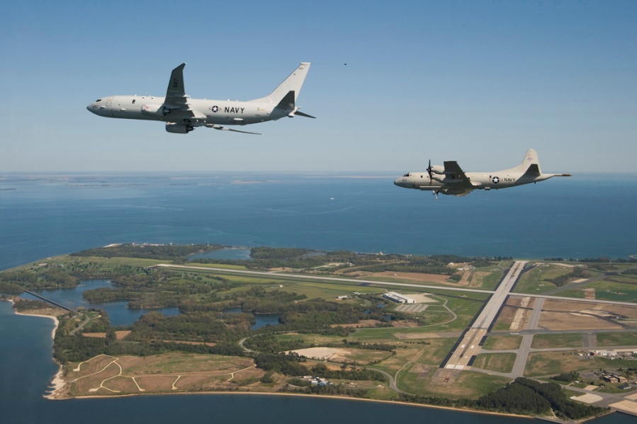 The U.S. Navy’s newest maritime patrol and reconnaissance test aircraft, P-8A Poseidon flies with a P-3C Orion along side, prior to landing at Naval Air Station Patuxent River, Md., on April 10, 2010. The P-8A began its formal flight test program at the Boeing Seattle facilities in October 2009 (US Navy photo by Liz Goettee)