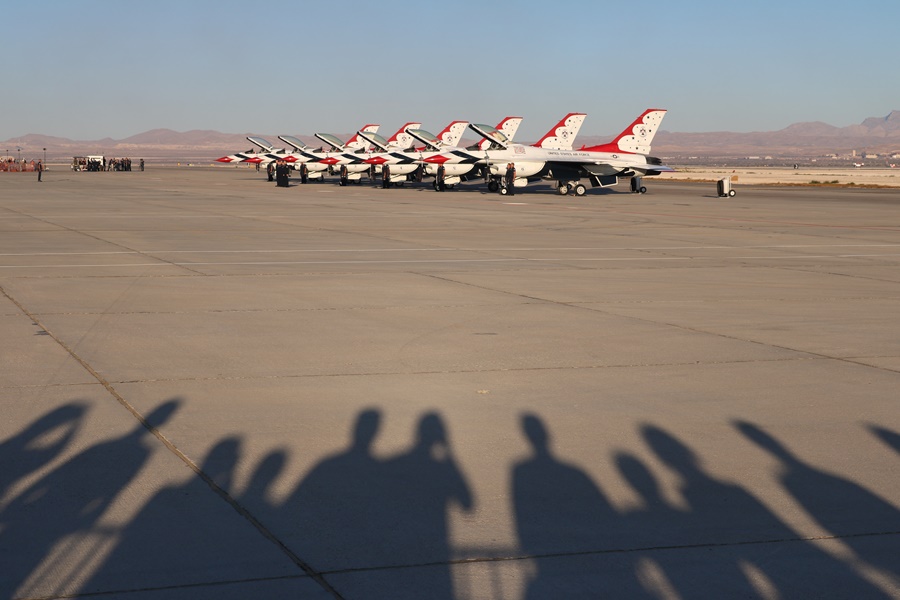 USAF Thunderbirds F-16's await the action on the tarmac early in the morning Aviation Nation 2016