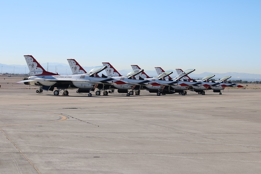 The USAF Thunderbirds F-16's await the action on the tarmac early in the morning Aviation Nation 2016