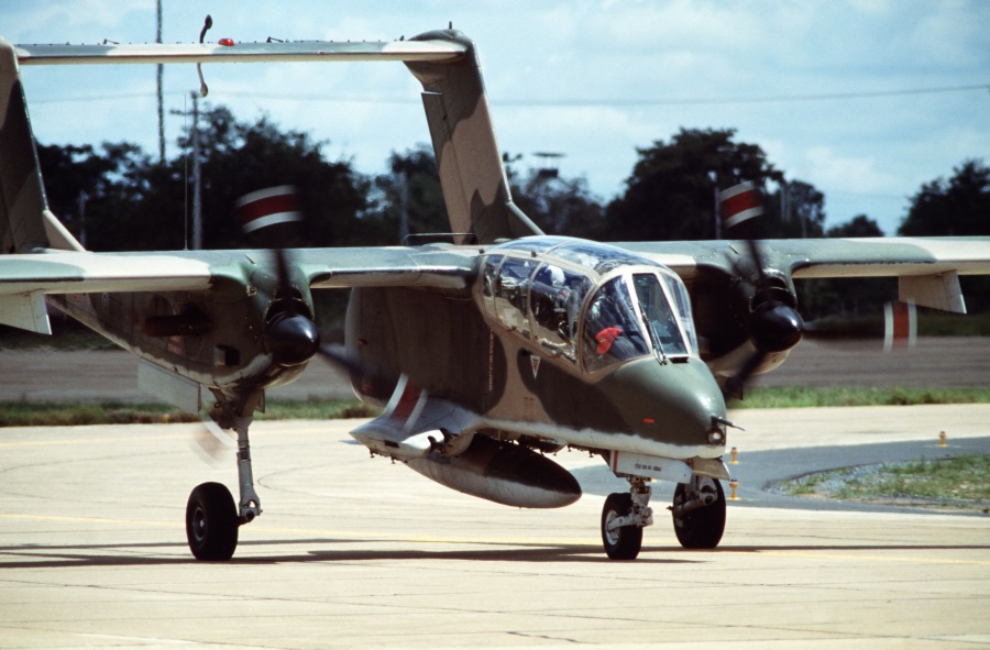 A Royal Thai Air Force North American OV-10C Bronco aircraft taxis on the runway before takeoff during exercise "Cobra Gold '87" at Korat Royal Thai Air Force Base on July 23rd, 1987